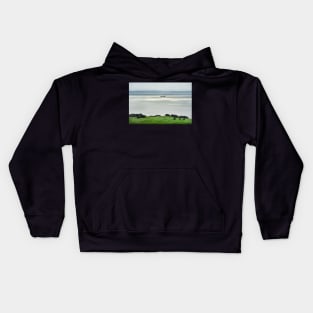 A ship moving along the Isle of Arran coast, Scotland Kids Hoodie